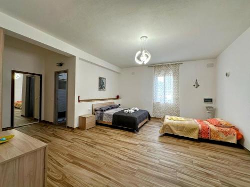 Postel nebo postele na pokoji v ubytování Casa Sole con Piscina Privata fronte Mare