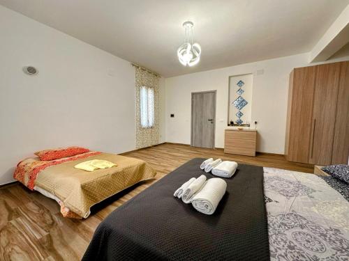 Postel nebo postele na pokoji v ubytování Casa Sole con Piscina Privata fronte Mare