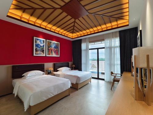 Postel nebo postele na pokoji v ubytování MonMonBoutique Hotel