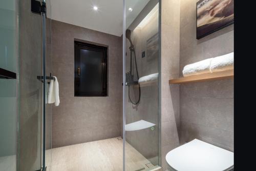 Ένα μπάνιο στο Atour Hotel Quanzhou Dehua