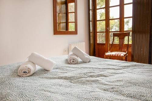 Postel nebo postele na pokoji v ubytování HOTEL BODEGA VERA DE ESTENAS