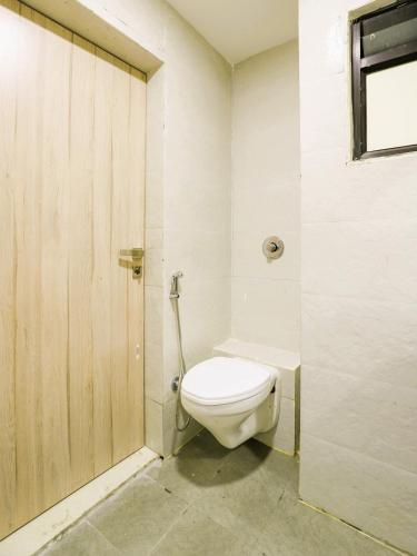 Un baño de StayGuru Hotel Atithi