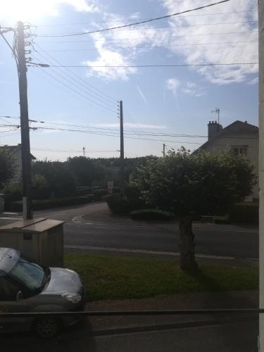 a car parked on the side of a street at Apiculteur loue 2 chambres dans cadre verdoyant in Pagny-sur-Meuse