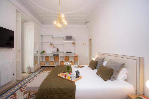 En eller flere senge i et værelse på SingularStays Ms Rogers