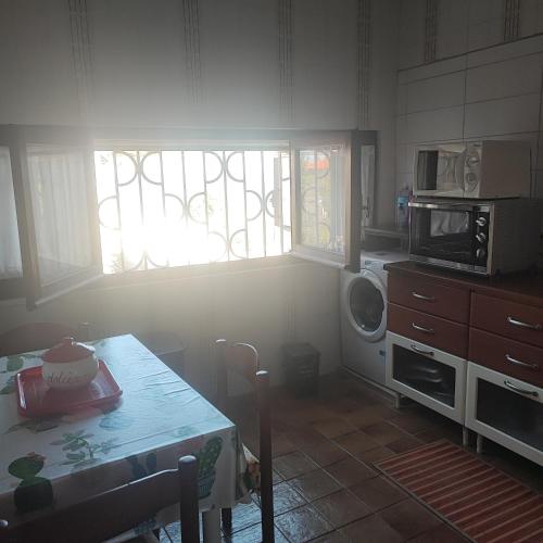 Η κουζίνα ή μικρή κουζίνα στο Villa M