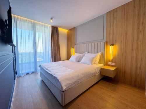 Ένα ή περισσότερα κρεβάτια σε δωμάτιο στο Villa Nikandra - A designer's dream -