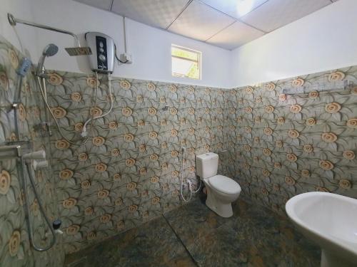 Koupelna v ubytování Sanu Home stay