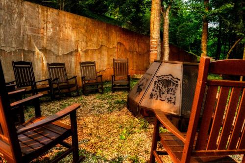 a group of chairs lined up against a wall at Great Alpine - 4 KingSuites- December Deals-Views-Hot Tub-FirePit-GameRm in Gatlinburg
