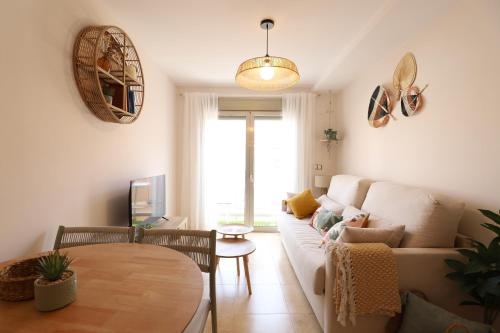 Ένα ή περισσότερα κρεβάτια σε δωμάτιο στο Tranquilo y delicioso rincón junto al mar