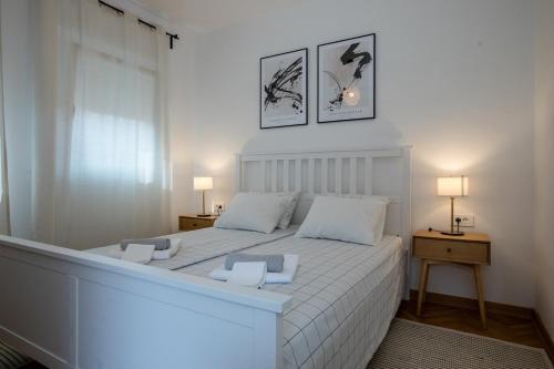 Кровать или кровати в номере Apartmet Jadran