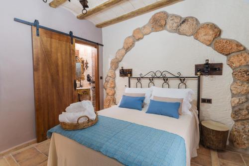 Postel nebo postele na pokoji v ubytování Casa rural el rincón del Altozano