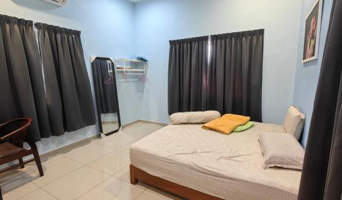 Postel nebo postele na pokoji v ubytování Seaside cottage room stays