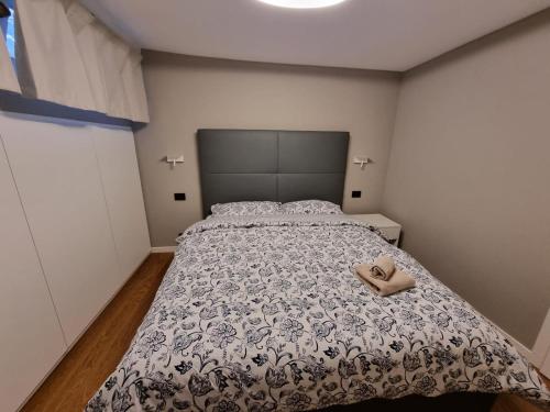 Voodi või voodid majutusasutuse Condominio Alpe Bardonay toas