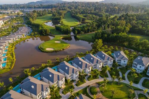 an aerial view of a resort with a golf course at Melia Vinpearl Phu Quoc in Phu Quoc