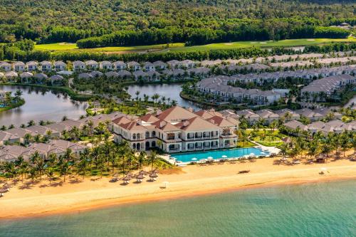 an aerial view of a resort with a beach at Melia Vinpearl Phu Quoc in Phu Quoc
