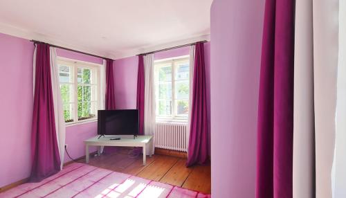 Телевизор и/или развлекательный центр в Hotel Maurerhansl