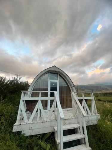 a small building in the middle of a field at Glamping Eco Valley in Shahumyan