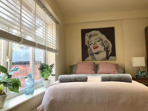 a bedroom with a bed and a window at Studio29A in London