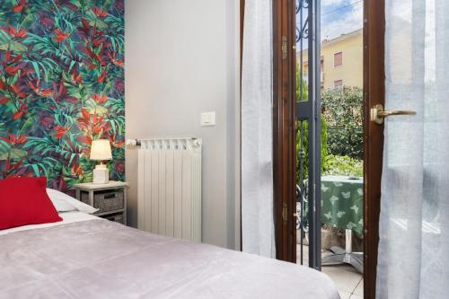 A bed or beds in a room at Residenza Il Fiore
