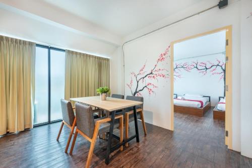 Una cama o camas en una habitación de SHIN Hotel Nimman ChiangMai