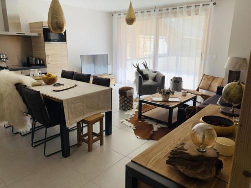 Ruang duduk di Appartement Cocooning-sauna-jacuzzi