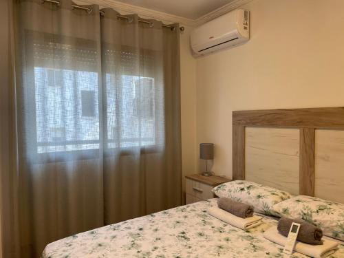 Ένα ή περισσότερα κρεβάτια σε δωμάτιο στο Parc Estación apartamento con 4 AC