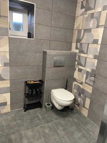 Koupelna v ubytování Karát Apartmanok