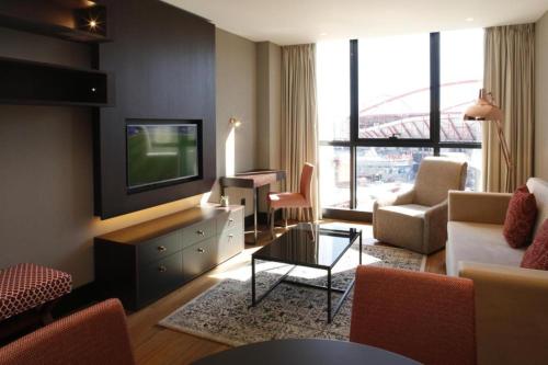 Ruang duduk di Upon Lisbon Prime Residences