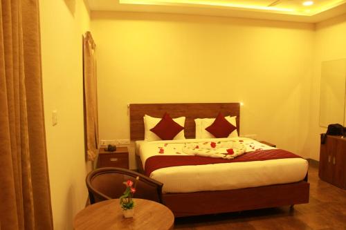 Katil atau katil-katil dalam bilik di Hotel Kairali