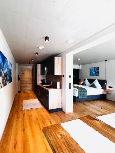 Postel nebo postele na pokoji v ubytování Hoisler's Appartements
