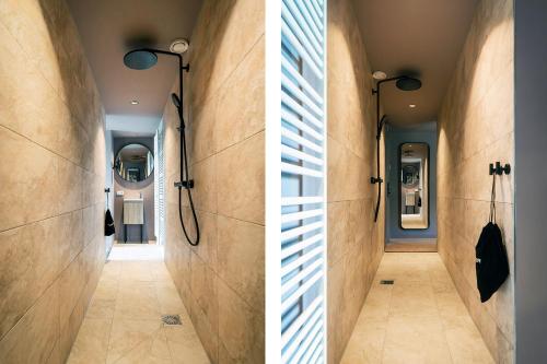 a hallway in a house with a tile floor at Prins Hendrik Texel in Oost
