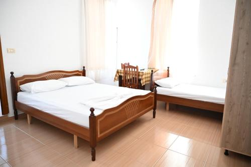 Postel nebo postele na pokoji v ubytování Hotel Justinian