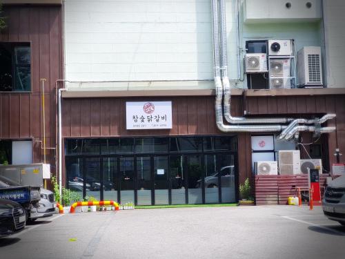 a building with a sign on the side of it at Bluebird Hotel in Incheon
