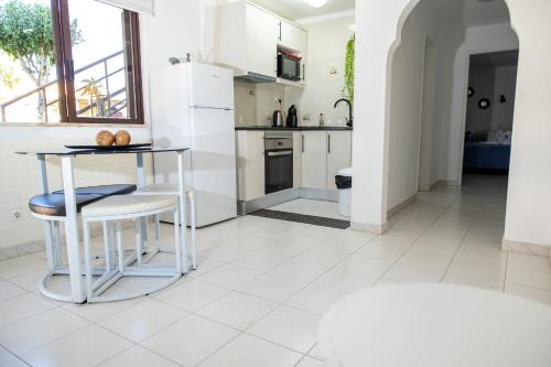 Η κουζίνα ή μικρή κουζίνα στο Bela Alexandra Guest House