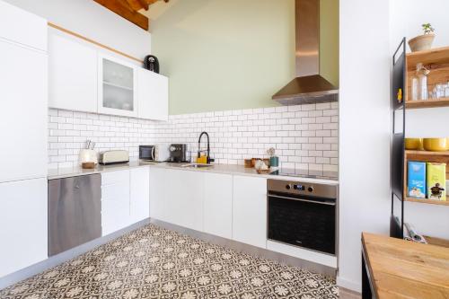 Green Tiles House