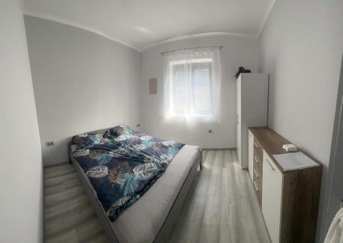 Postel nebo postele na pokoji v ubytování Appartamento Mattia