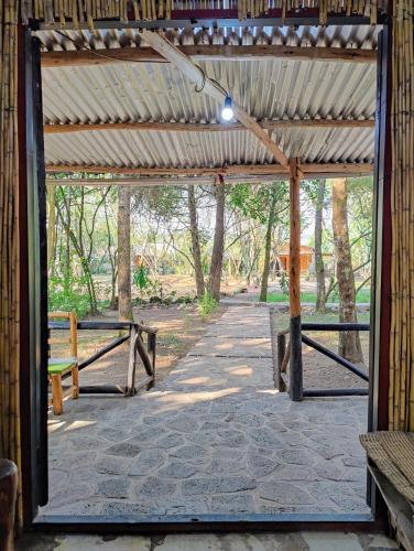 Κήπος έξω από το Red Rocks Rwanda - Campsite & Guesthouse
