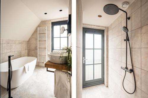 a bathroom with a bath tub and a shower at Prins Hendrik Texel in Oost