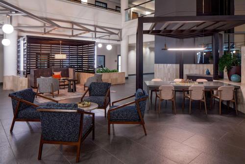 a dining room with a table and chairs at Doubletree Suites by Hilton Salt Lake City in Salt Lake City