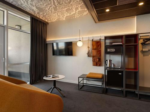 ibis Kyiv Beresteiskaにあるテレビまたはエンターテインメントセンター