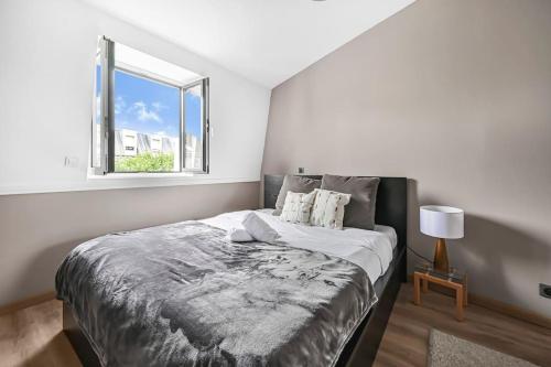 Postel nebo postele na pokoji v ubytování Le Finhley - 5p - Proche Disney & Paris