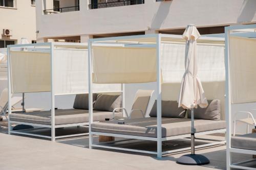 a group of bunk beds on a rooftop at Abacus Suites in Ayia Napa