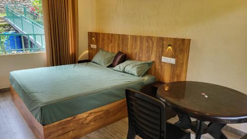 Ein Bett oder Betten in einem Zimmer der Unterkunft Green Cradle