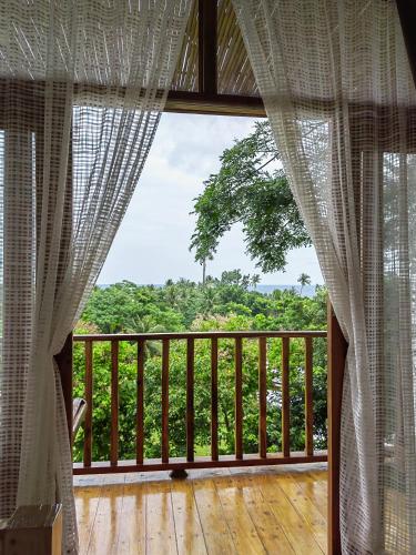 Balkoni atau teres di MHARI Bungalows