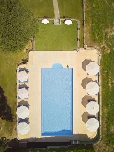 an overhead view of a swimming pool in a yard at Vigna Dell'Acqua in Santo Stefano Belbo