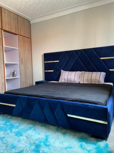 Ένα ή περισσότερα κρεβάτια σε δωμάτιο στο Thee haven Boulevard