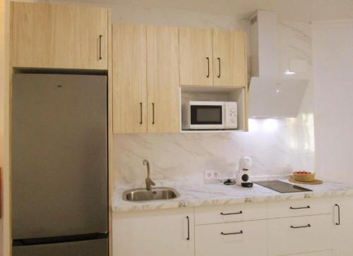 Η κουζίνα ή μικρή κουζίνα στο APARTAMENTO SOL