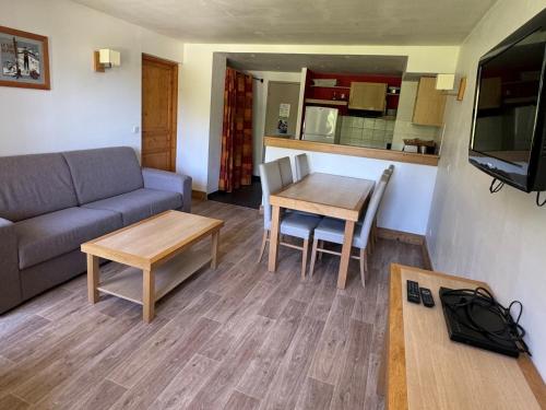 Appartement cosy avec accès direct aux pistes, espace bien-être et piscine chauffée