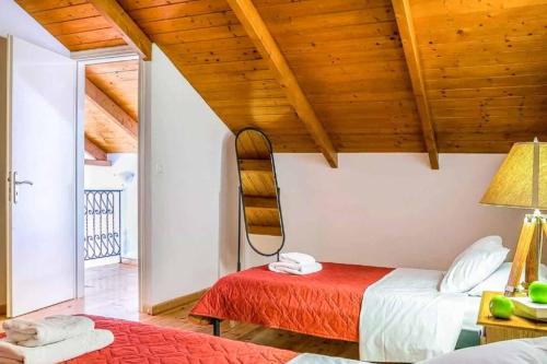 Postel nebo postele na pokoji v ubytování Villa Irida Nidri