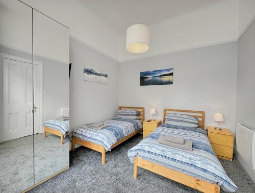 Katil atau katil-katil dalam bilik di Hayfield Apartment